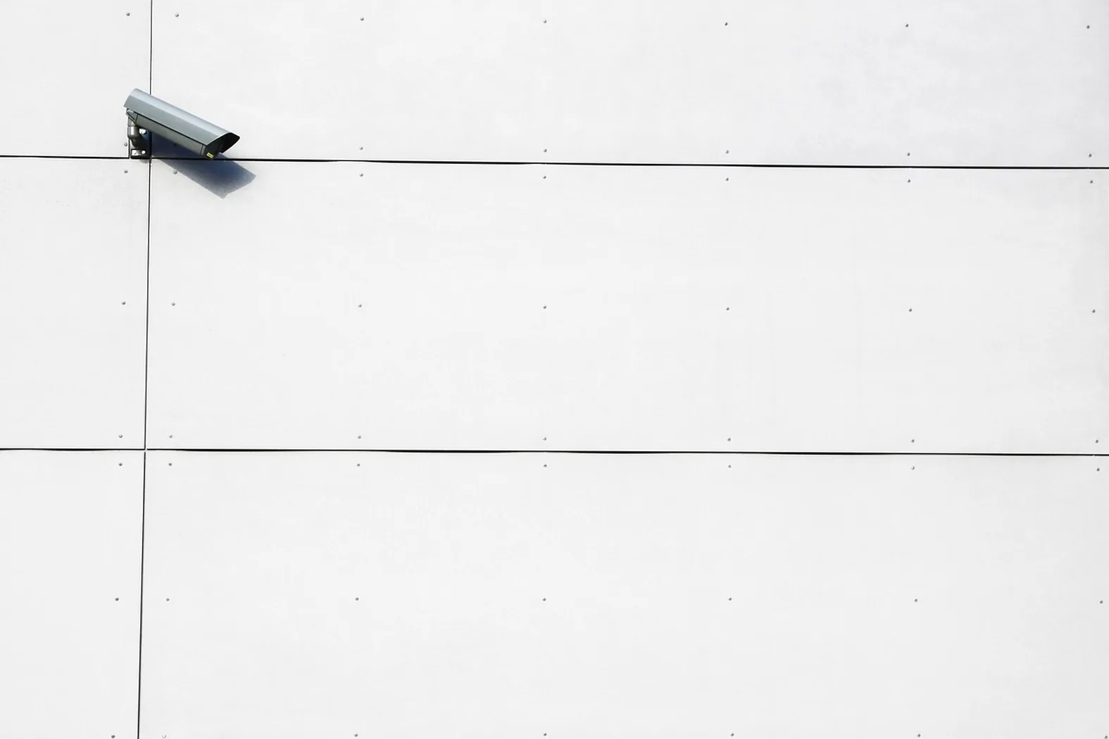 Security camera above a business entrance in Wentzville, MO